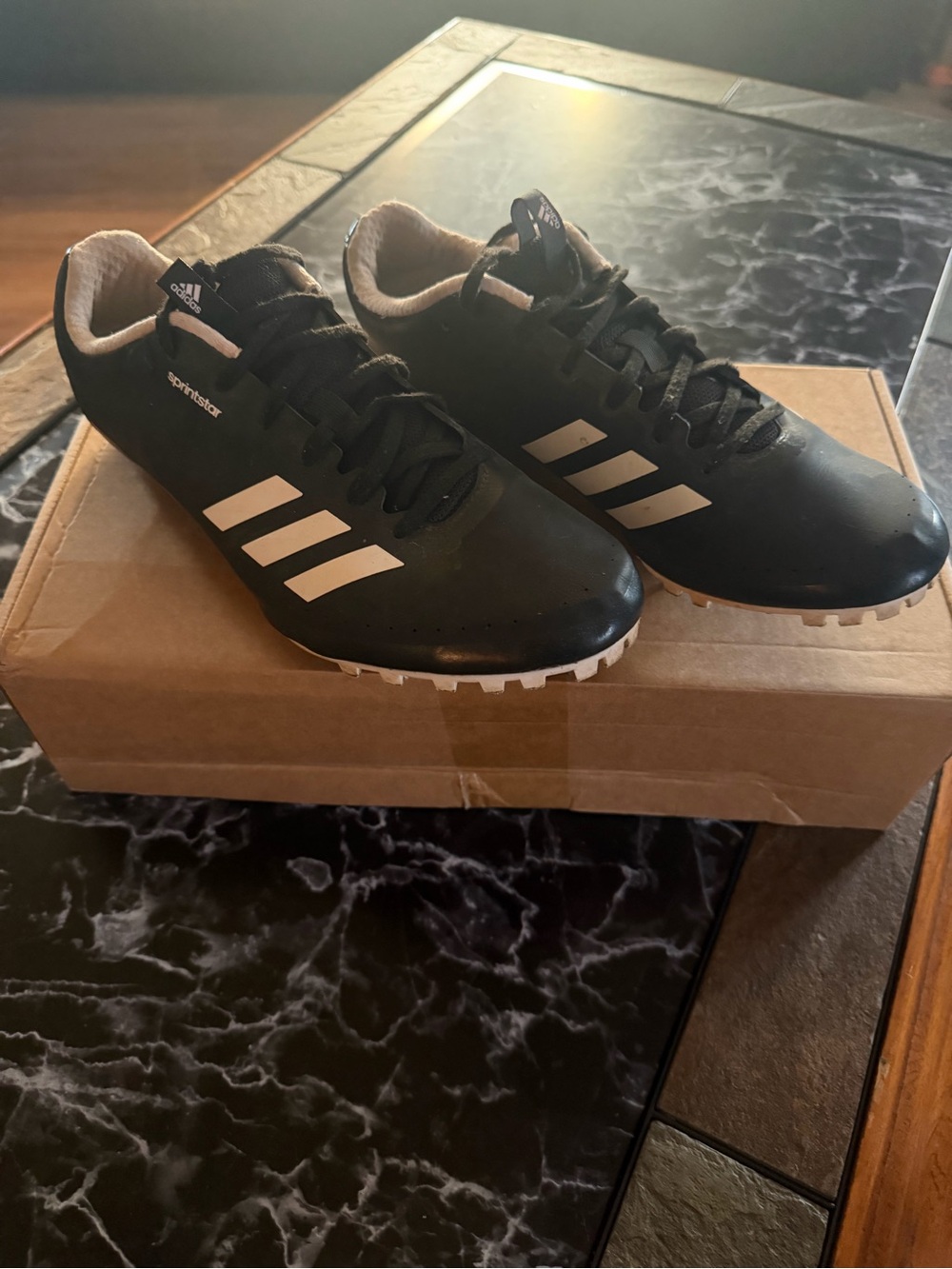 adidas Men’s Black Athletic Cleats with White Stripes